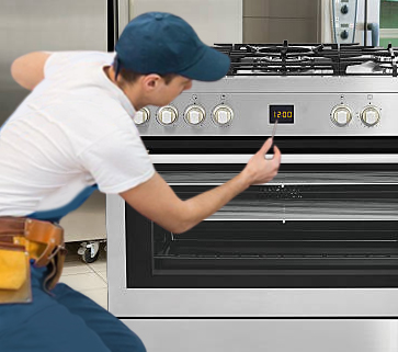 Technician in uniform adjusting digital controls on a commercial kitchen stove in a clean, professional environment.